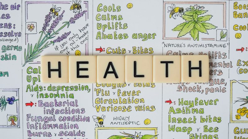 Creative representation of herbal health benefits using illustrated letter tiles spelling 'health'. — Access Medical Experts 